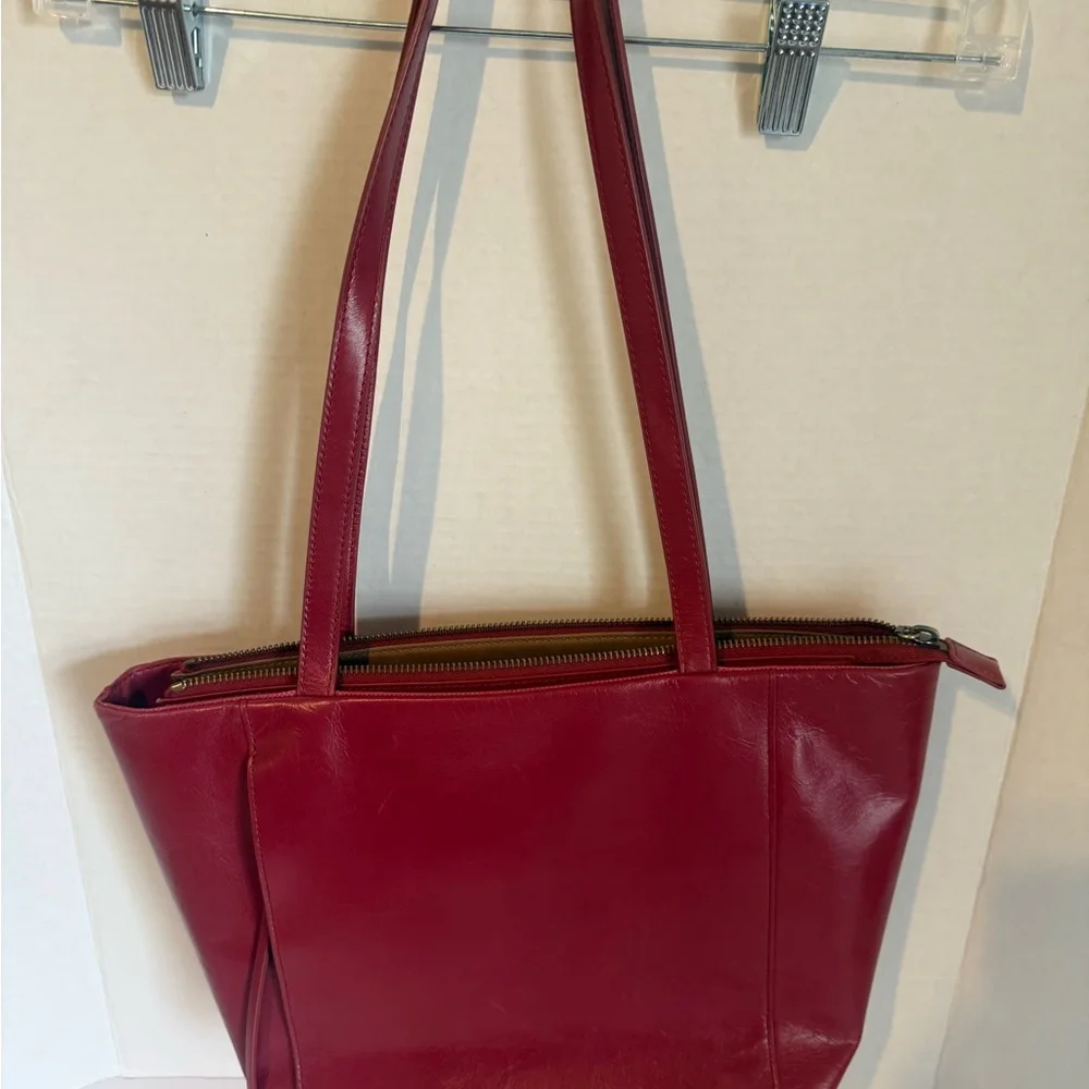 Hobo Cranberry Trapezoid Shoulder Bag w/Zipper Accent Gold Hardware Inner Pocket